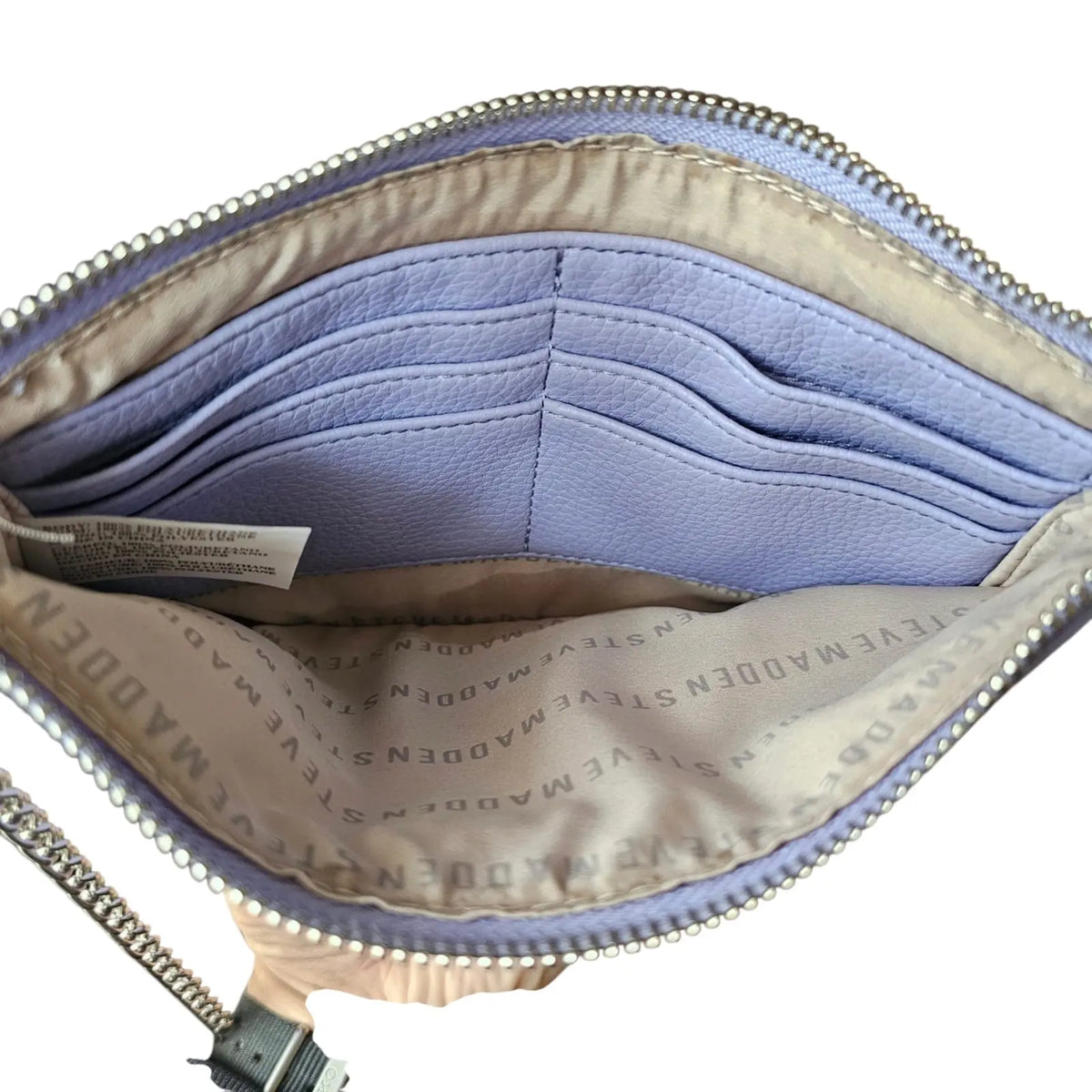 bolso de mano / cosmetiquero lila pastel steve madden