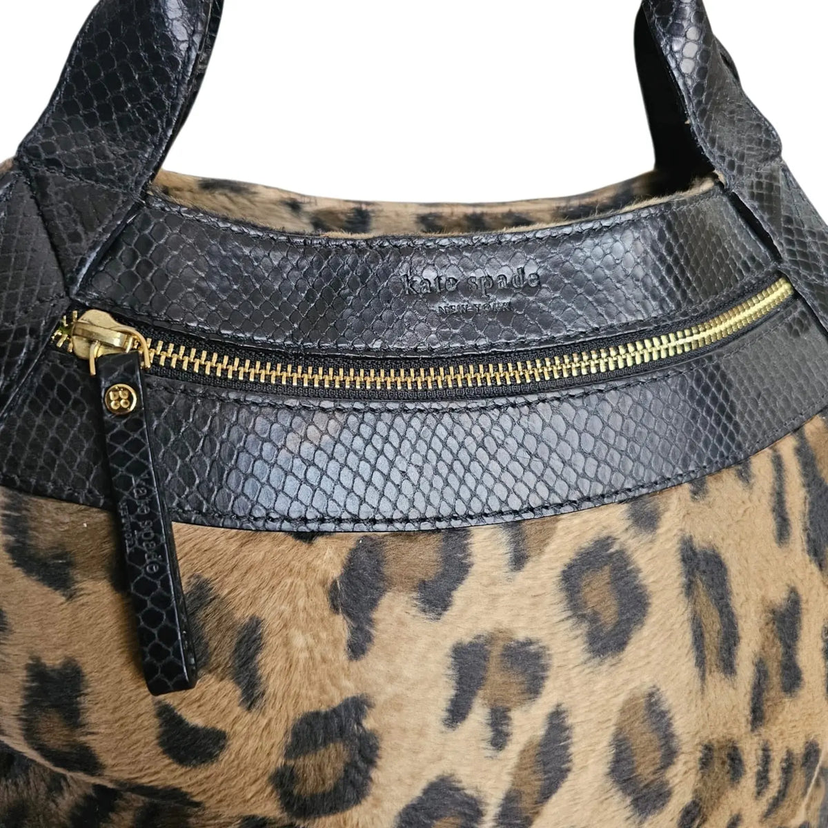 cartera animal print kate space