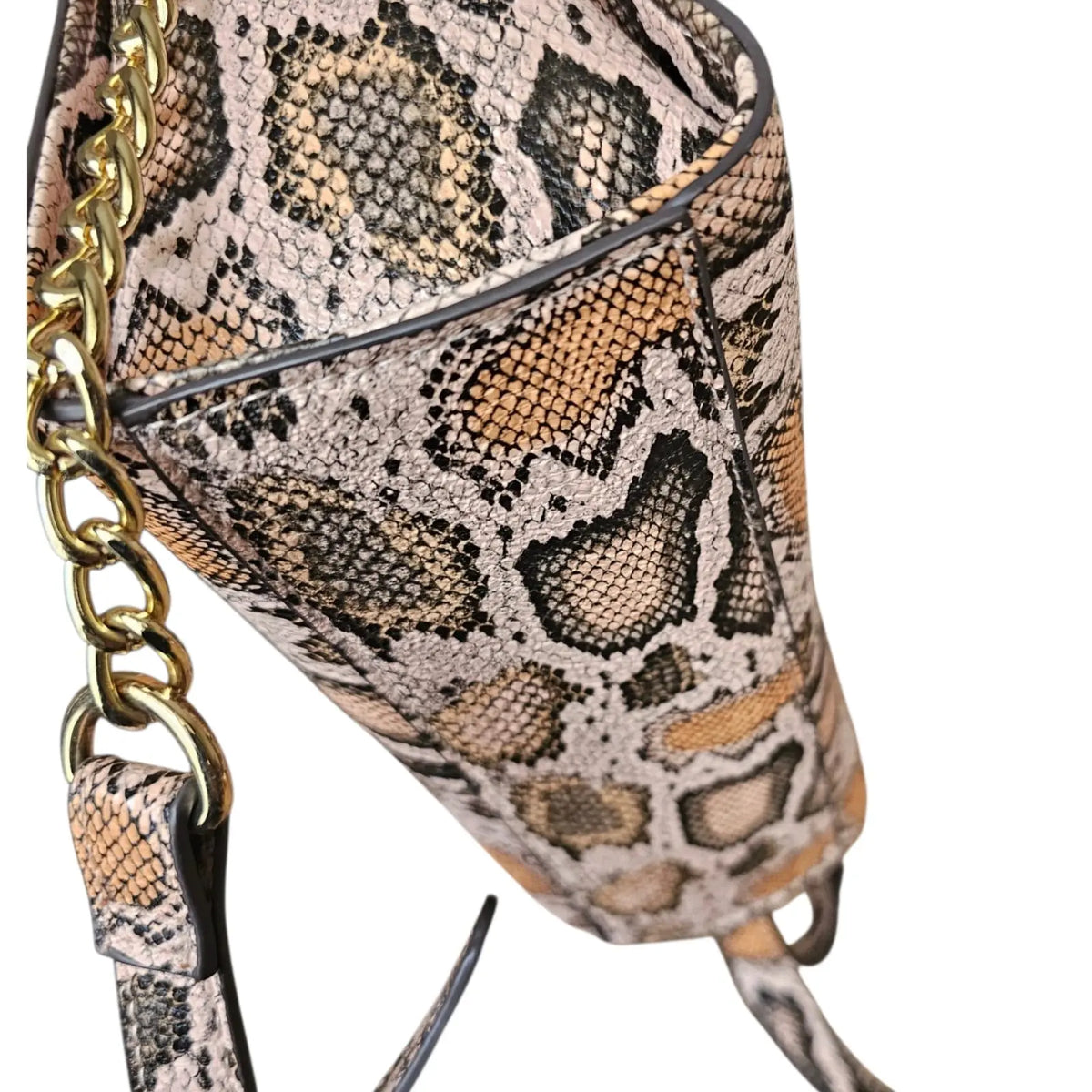 cartera crossbody estampado serpiente rosa steve madden