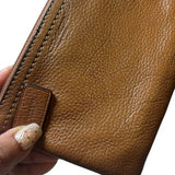 wrislet Coach cuero genuino camel