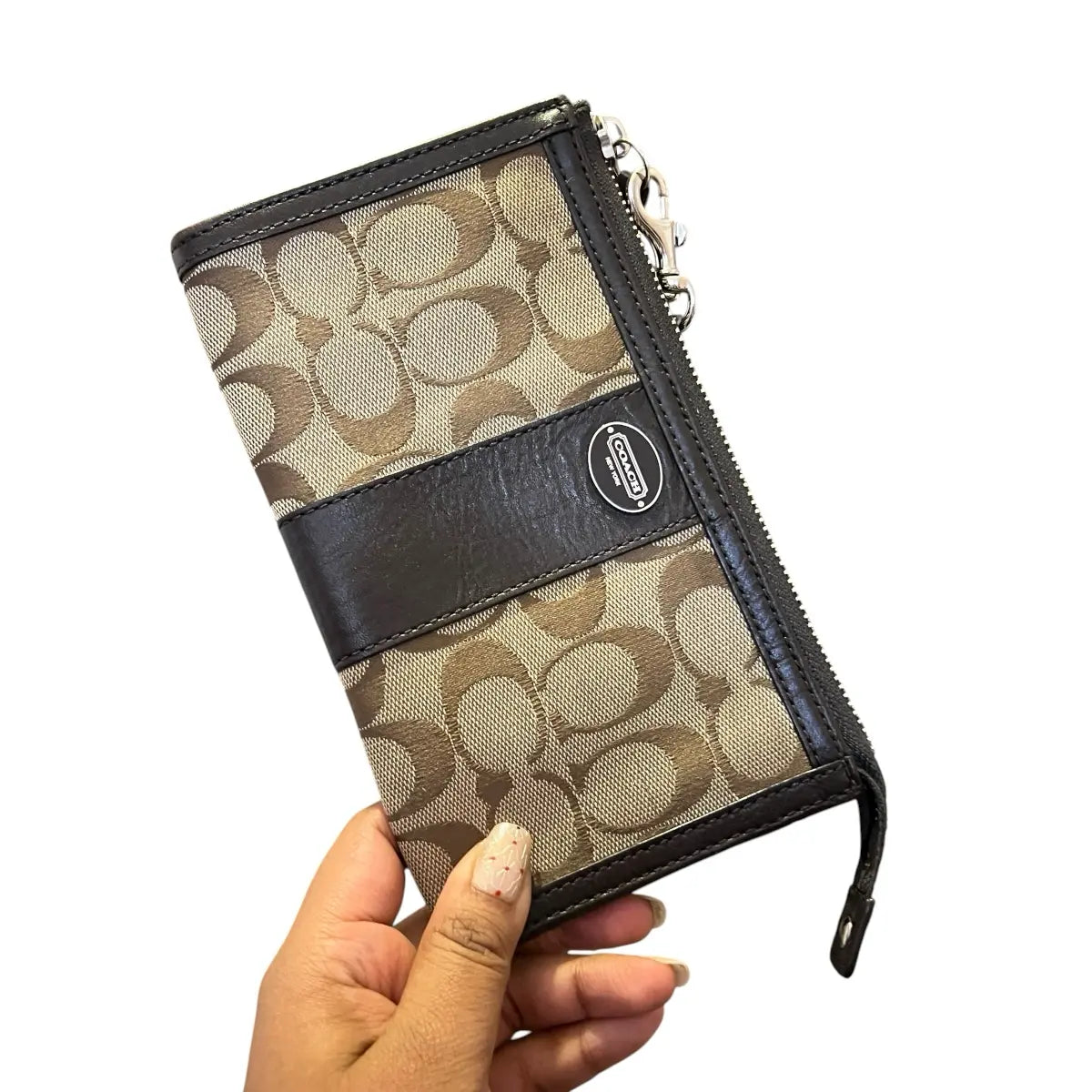 estuche coach lona y cuero logotipado café