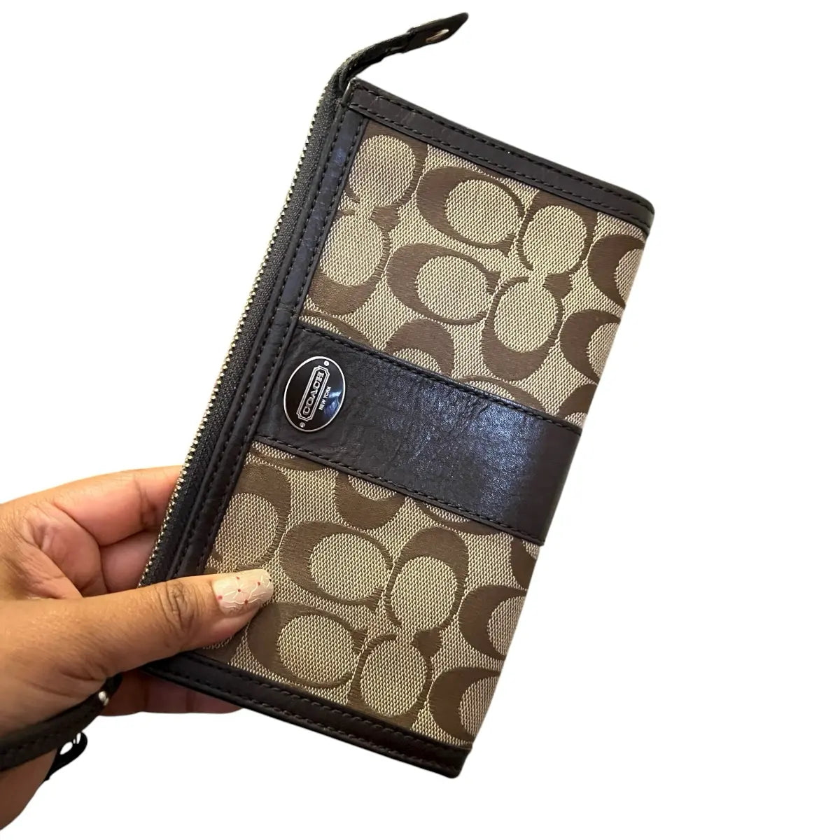 estuche coach lona y cuero logotipado café
