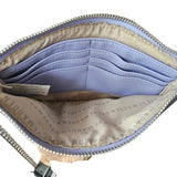 bolso de mano / cosmetiquero lila pastel steve madden