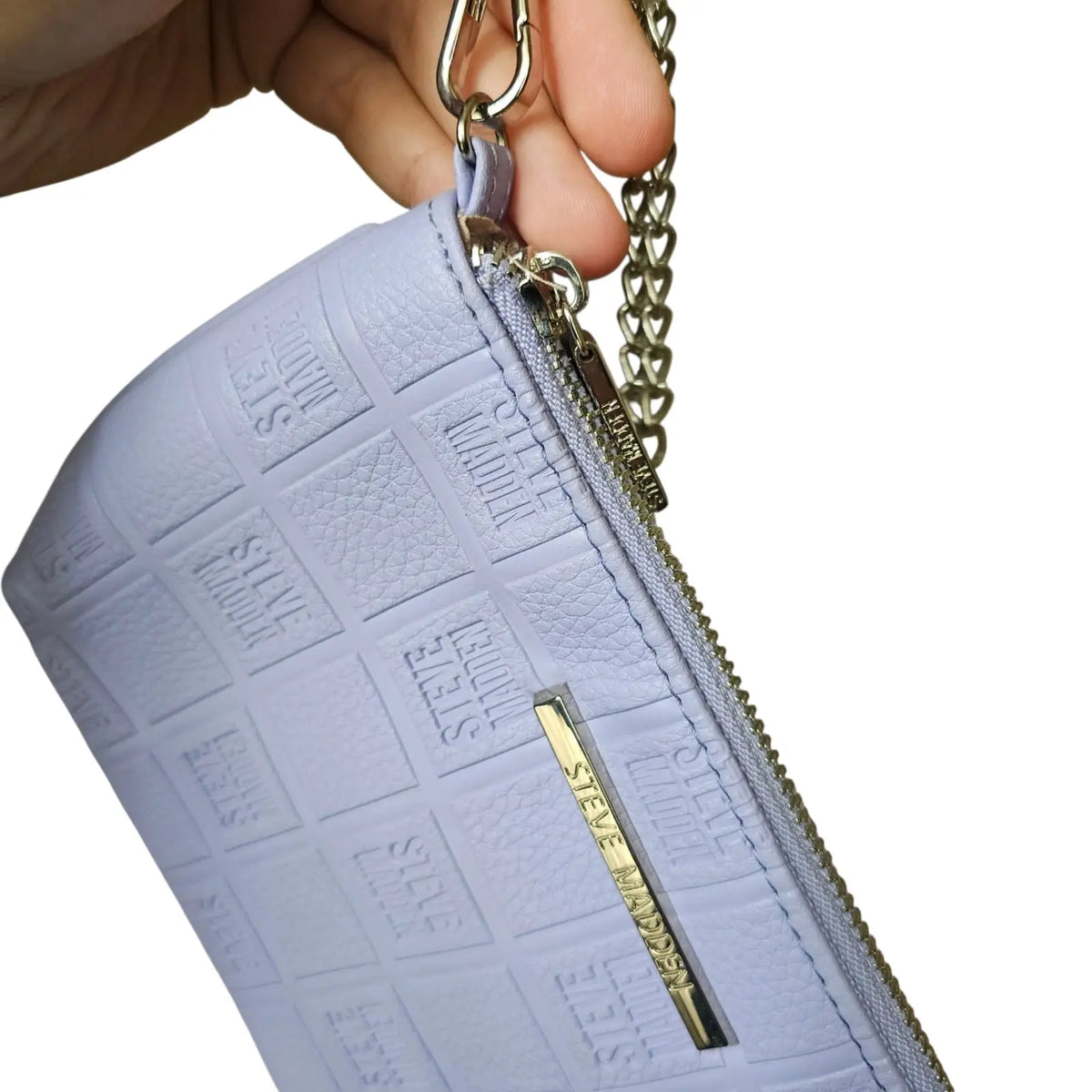 bolso de mano / cosmetiquero lila pastel steve madden