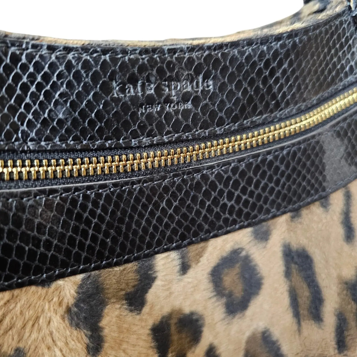 cartera animal print kate space