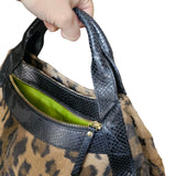 cartera animal print kate space