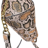 cartera crossbody estampado serpiente rosa steve madden