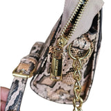 cartera crossbody estampado serpiente rosa steve madden